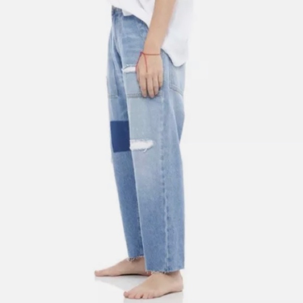 Free People SR vs Sandrine Rose indigo distressed cargo jeans with patch.
